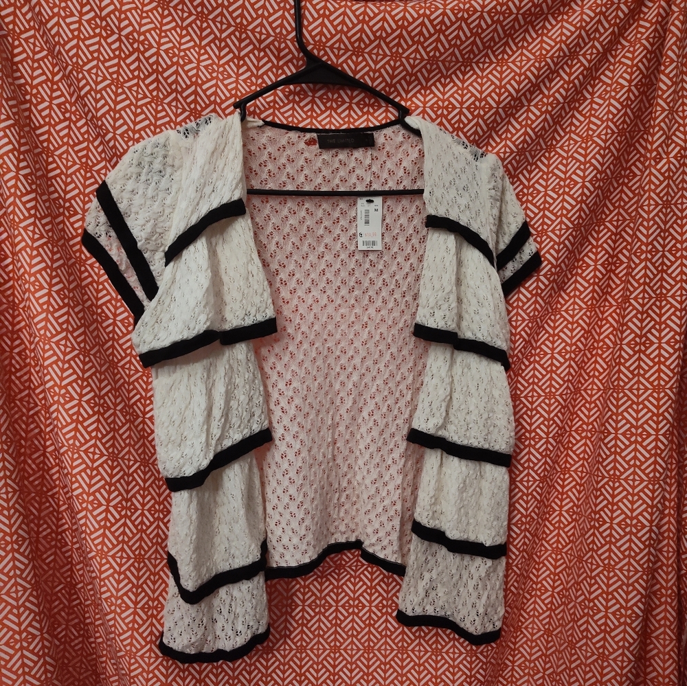 The limited ruffled short sleeve blouse